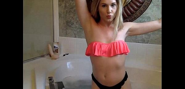  Blonde Shemale in tub with dildo